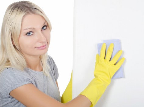 Professional carpet cleaners treating a stained carpet in West Norwood